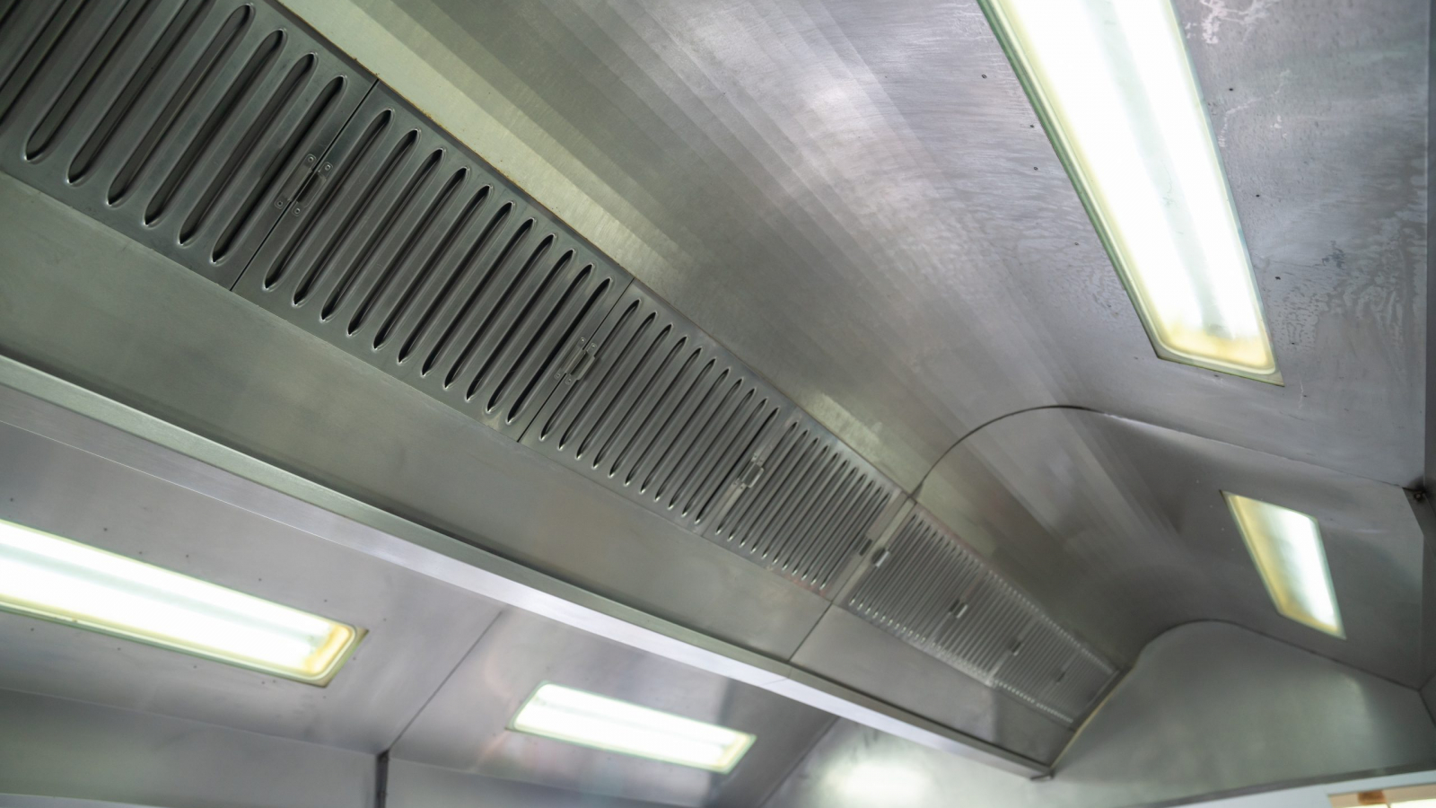 hood in restaurant kitchen of a professional kitchen. Modern kitchen.