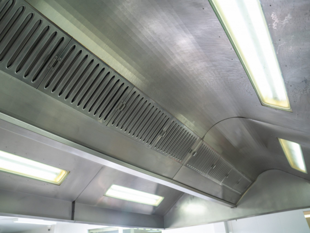 hood in restaurant kitchen of a professional kitchen. Modern kitchen.